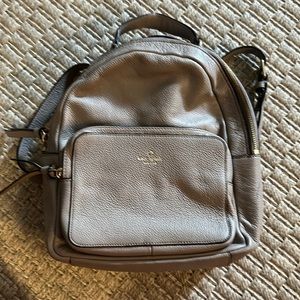 Kate Spade, backpack and wallet.